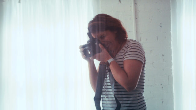Still frame for a photographer's Brand Story Video.